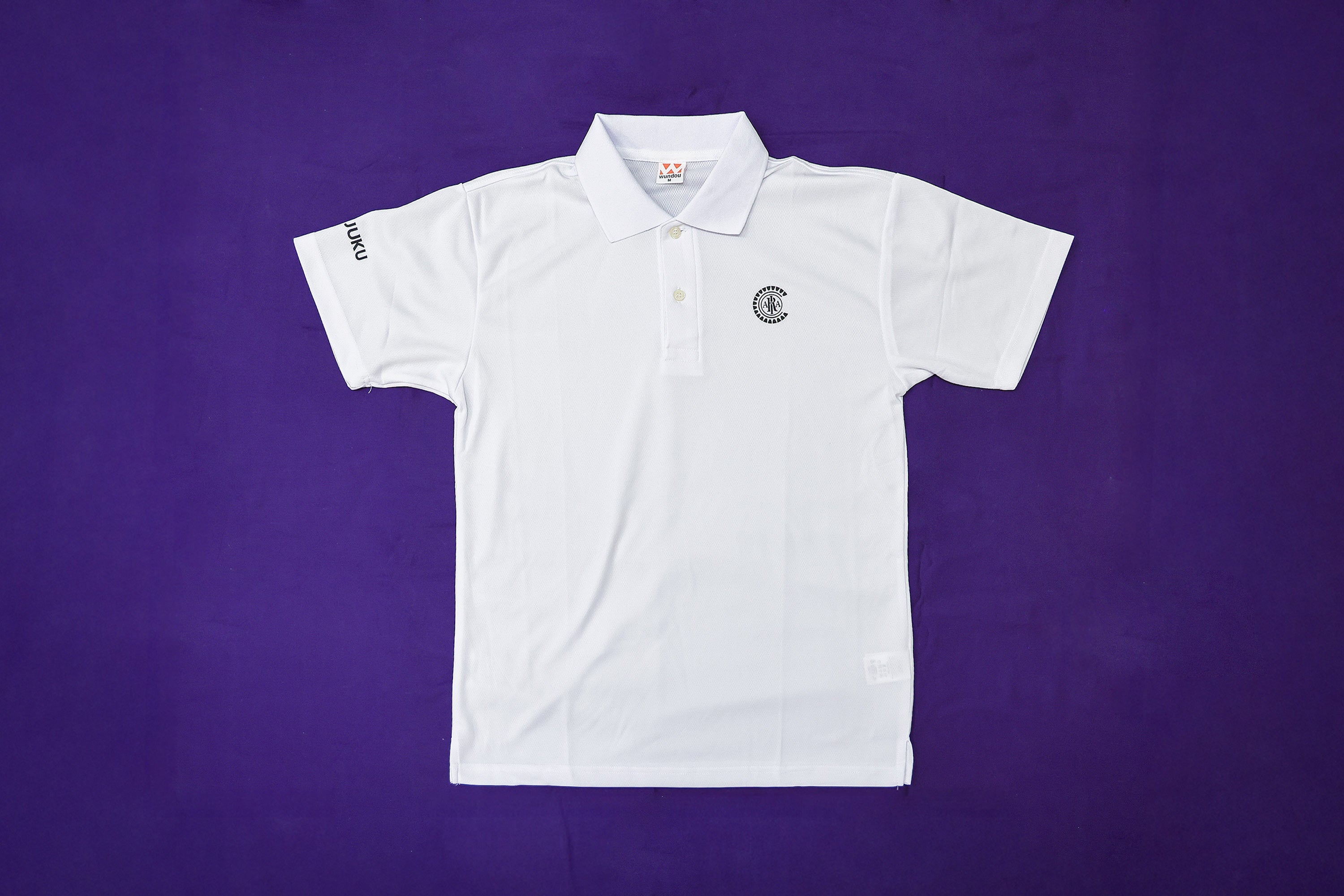 エンブレムポロシャツ