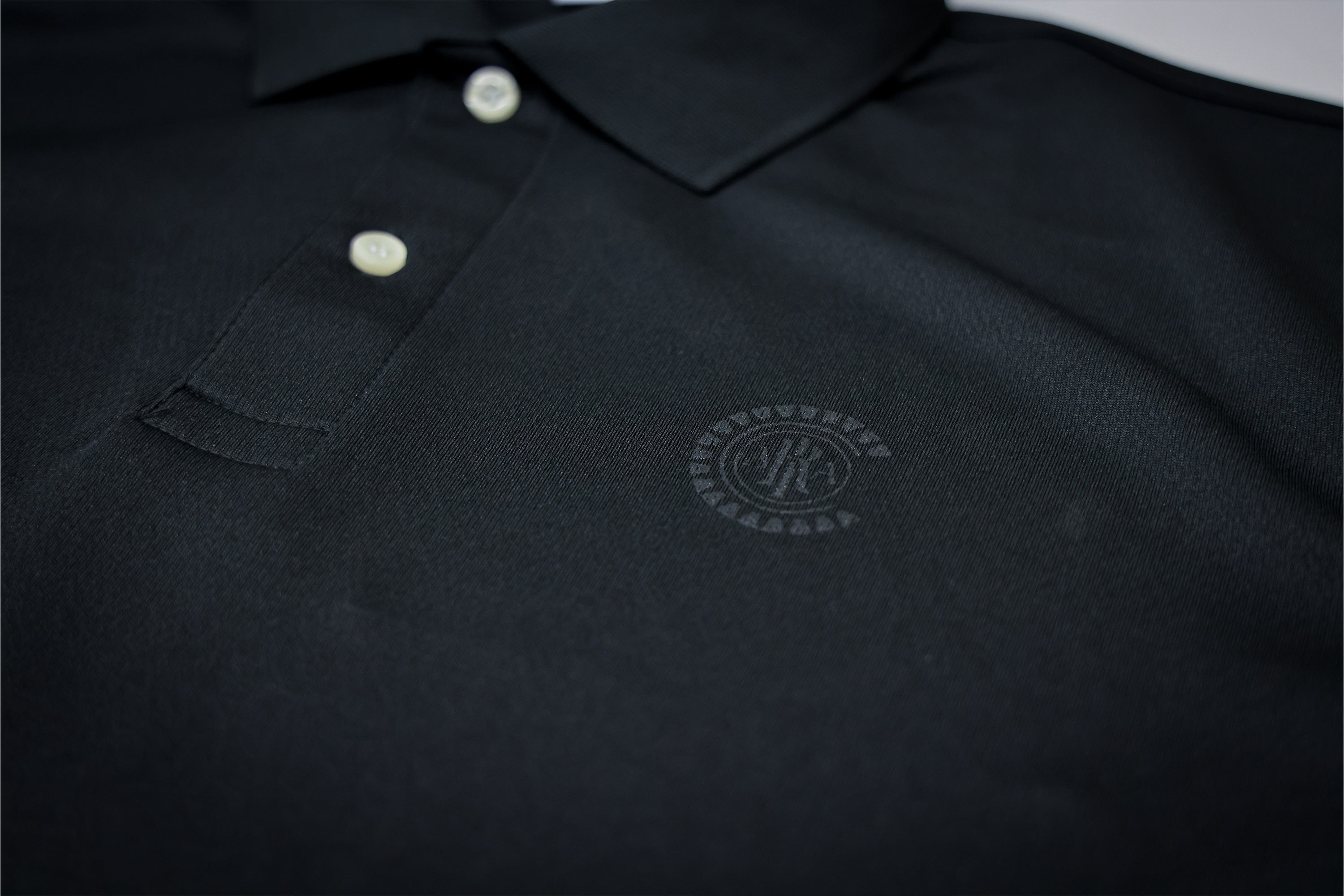 エンブレムポロシャツ