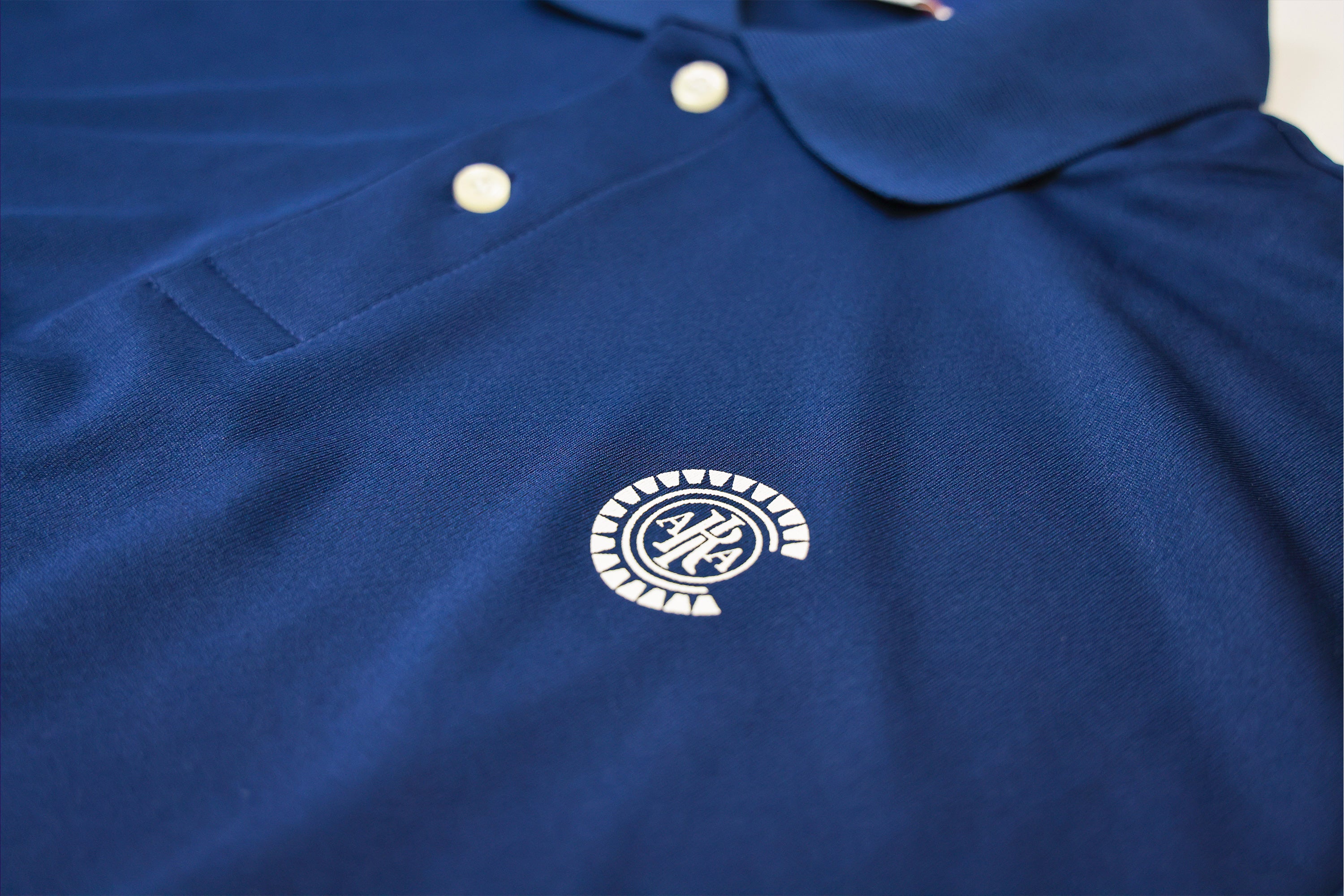 エンブレムポロシャツ